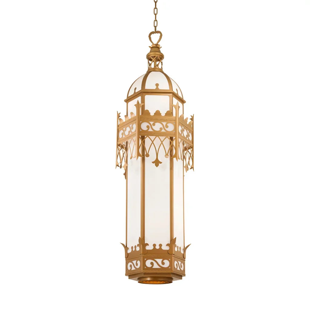 Gold-toned ornate lantern with frosted glass panels and intricate scrollwork detailing.