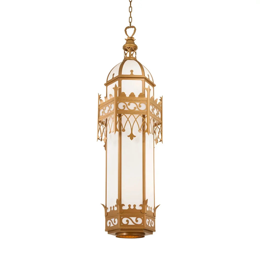 Gold-toned ornate lantern with frosted glass panels and intricate scrollwork detailing.