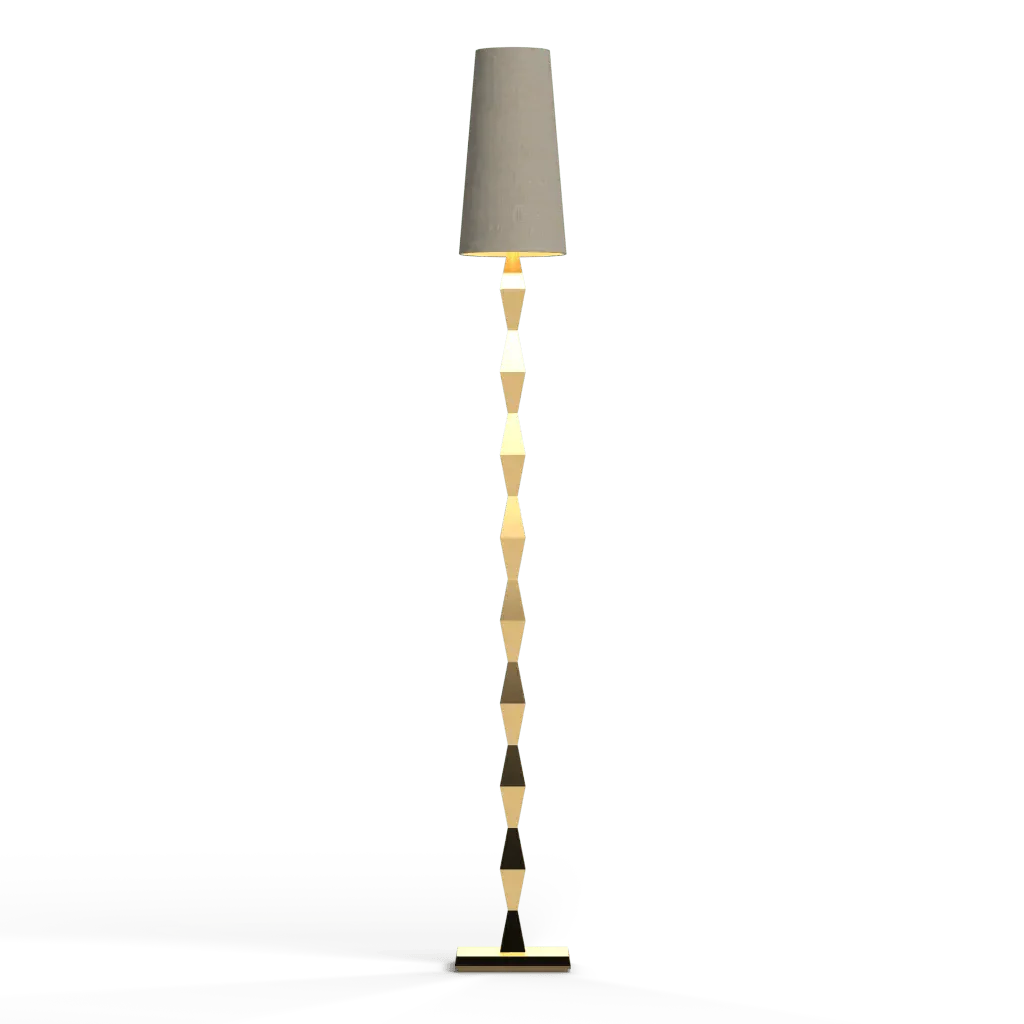 A tall modern floor lamp with a light-colored cylindrical shade and a gold-toned geometric segmented stand.