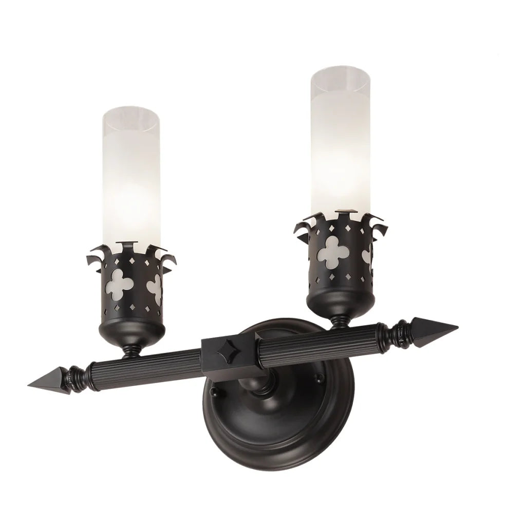Black wrought iron two-light wall sconce with frosted glass shades and fleur-de-lis cutouts