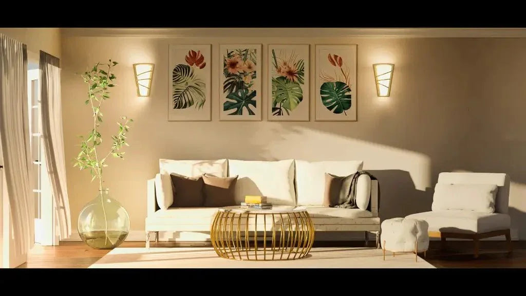 Bound sconce modern wall light with sleek design in a living room featuring white sofa gold coffee table and botanical prints