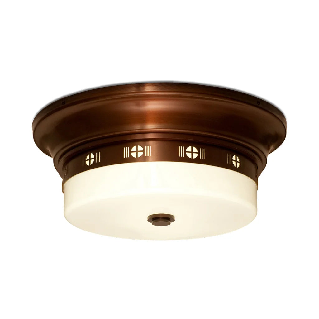 Bronze and white flush mount ceiling light with geometric pattern.