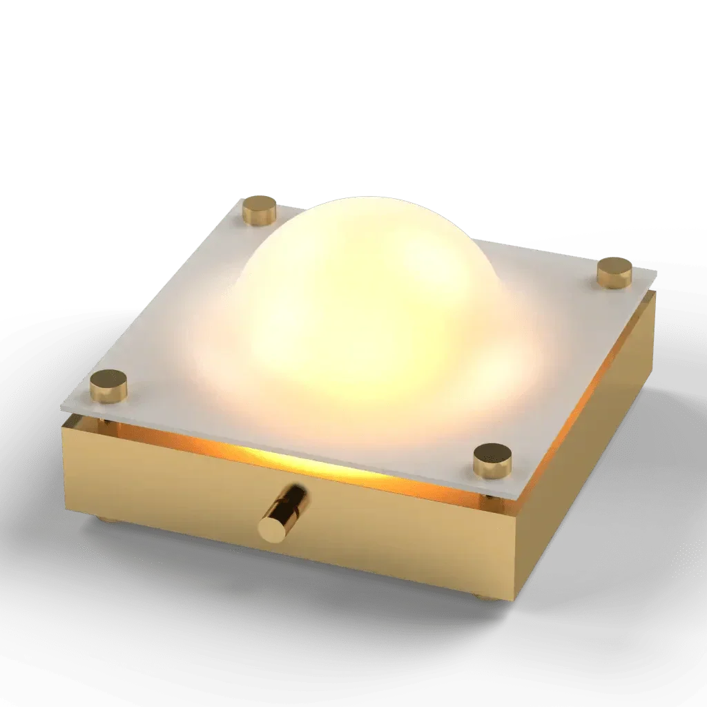 Cupola table lamp with a sleek golden base, white square top, and glowing spherical light for modern interiors