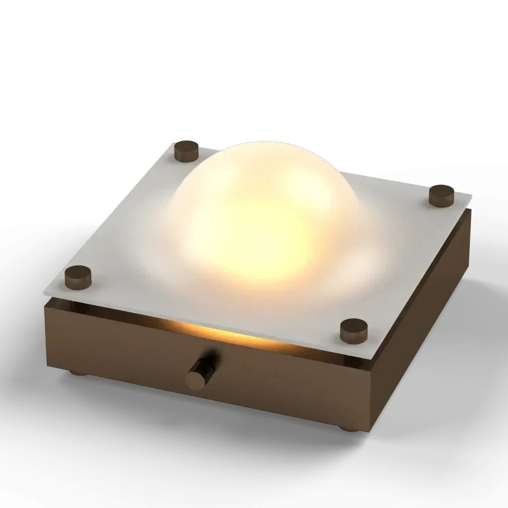 Cupola table lamp with a square light-colored modern base and a glowing domed top for ambient lighting