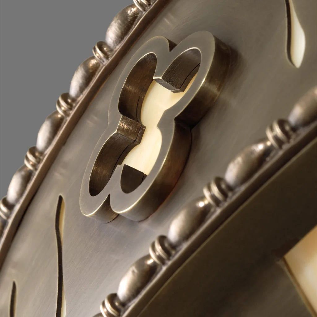 Silver butterfly-shaped door knocker with intricate detailing and a polished finish.