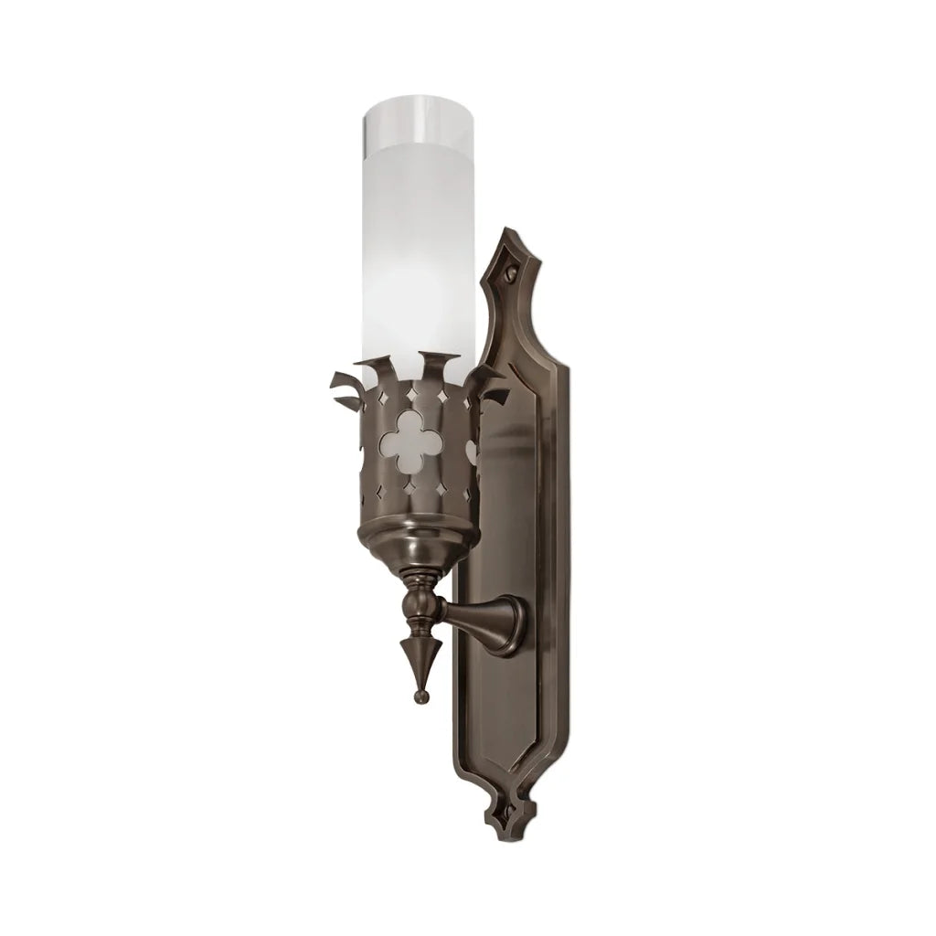 Antique bronze wall sconce with frosted glass shade and ornate detailing.