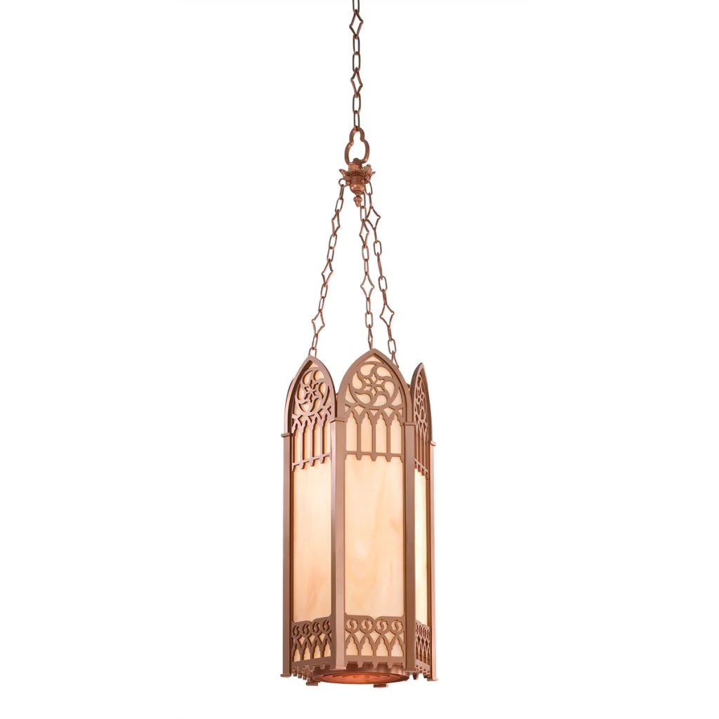 Copper-colored gothic lantern with intricate cut-out designs and a glass panel.