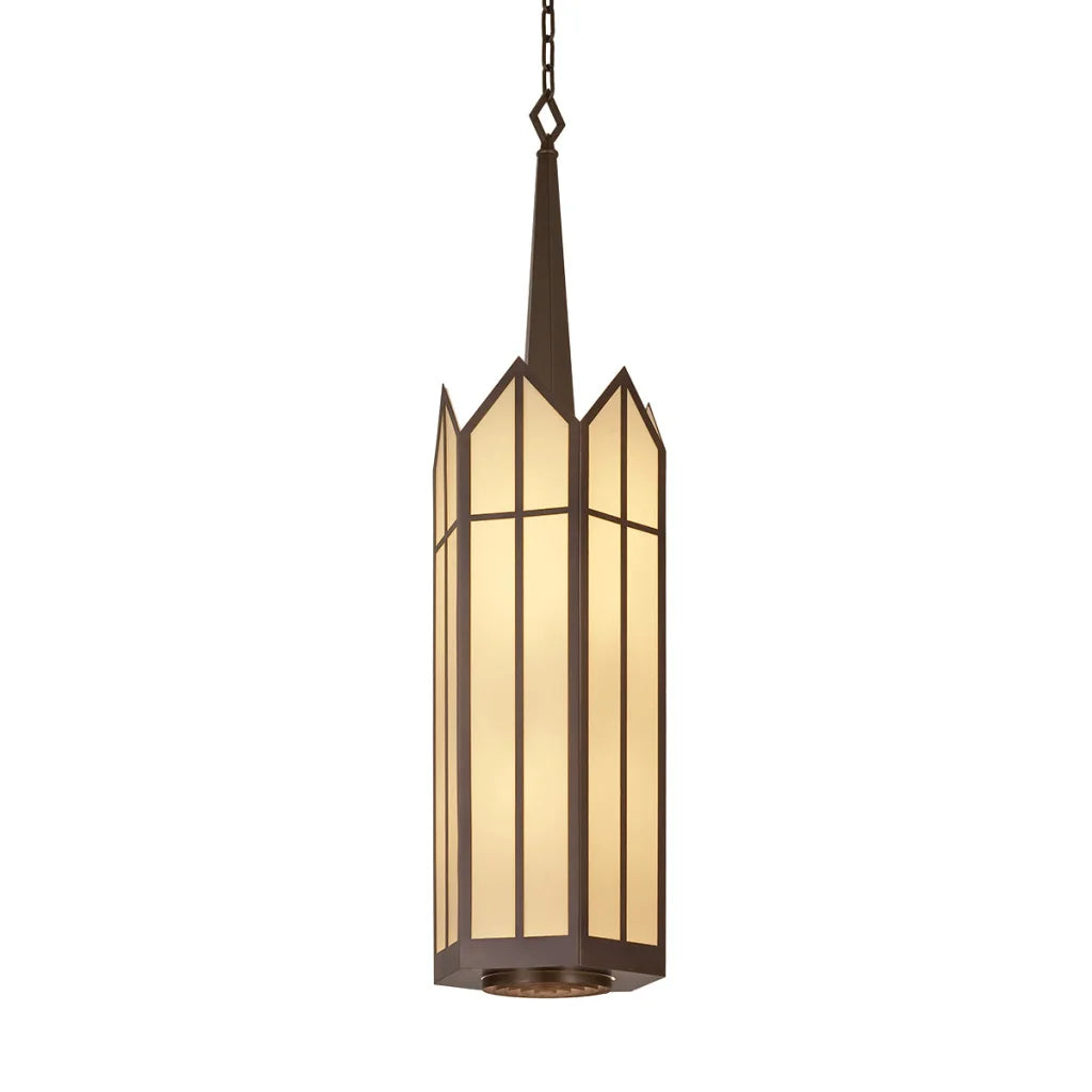 Modern bronze pendant light with geometric glass panels and a warm glow.