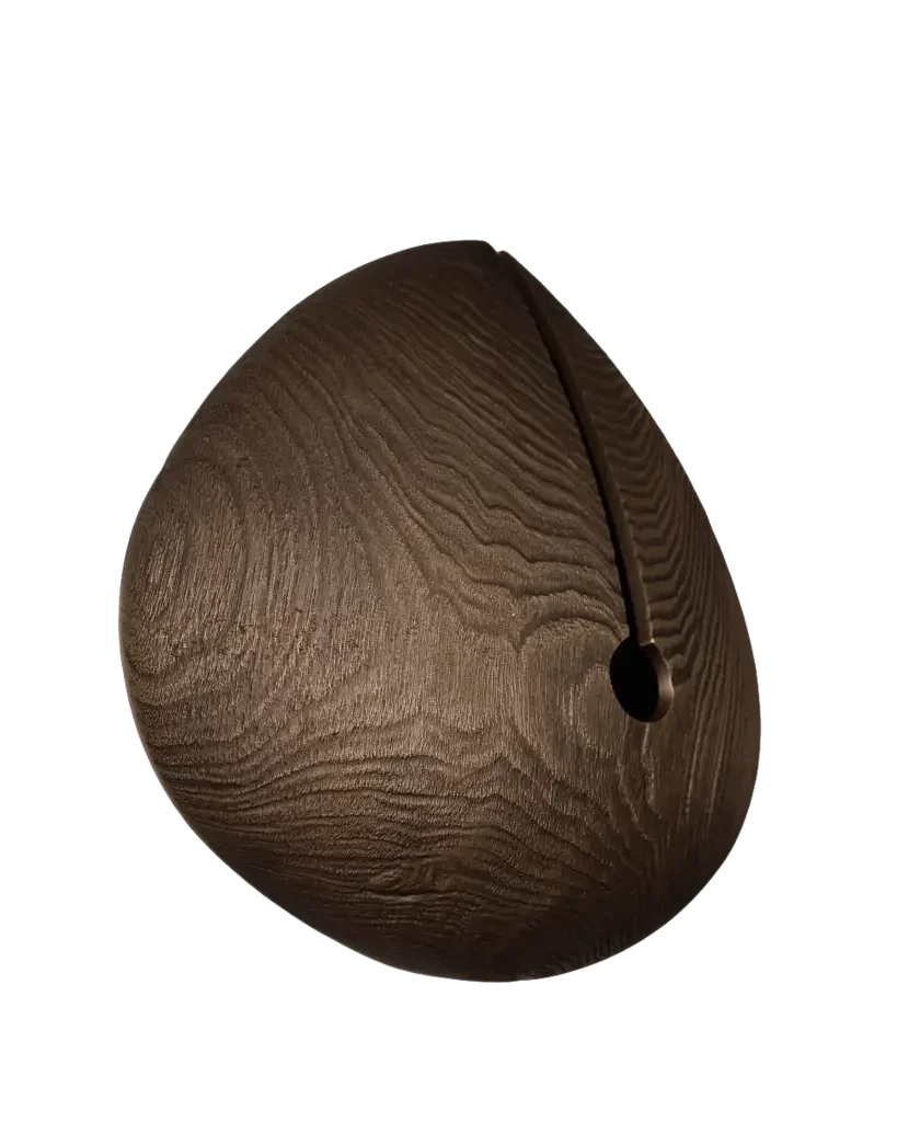 A dark brown wooden ocarina with a distinct wood grain pattern from the Lignum Sconce collection