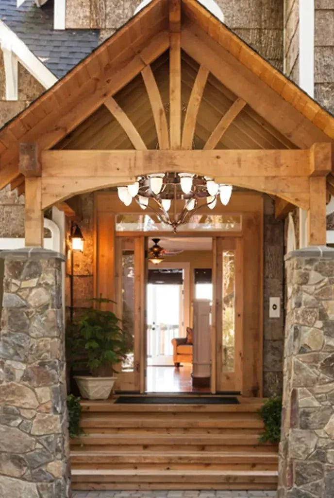 Lindos chandelier hanging on a rustic wooden and stone house entrance porch with visible front door