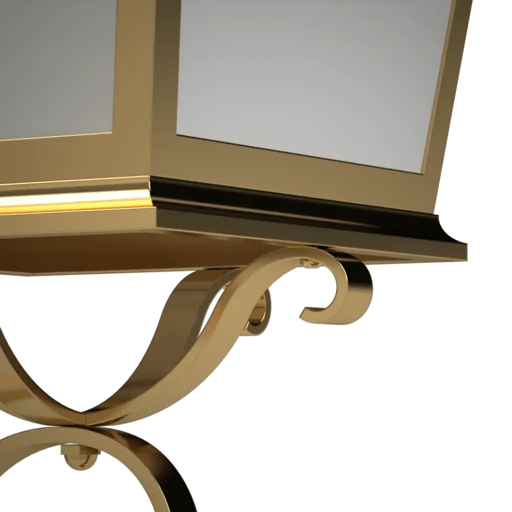 A golden Manchester sconce lantern with ornate scrollwork designed for decorative wall lighting