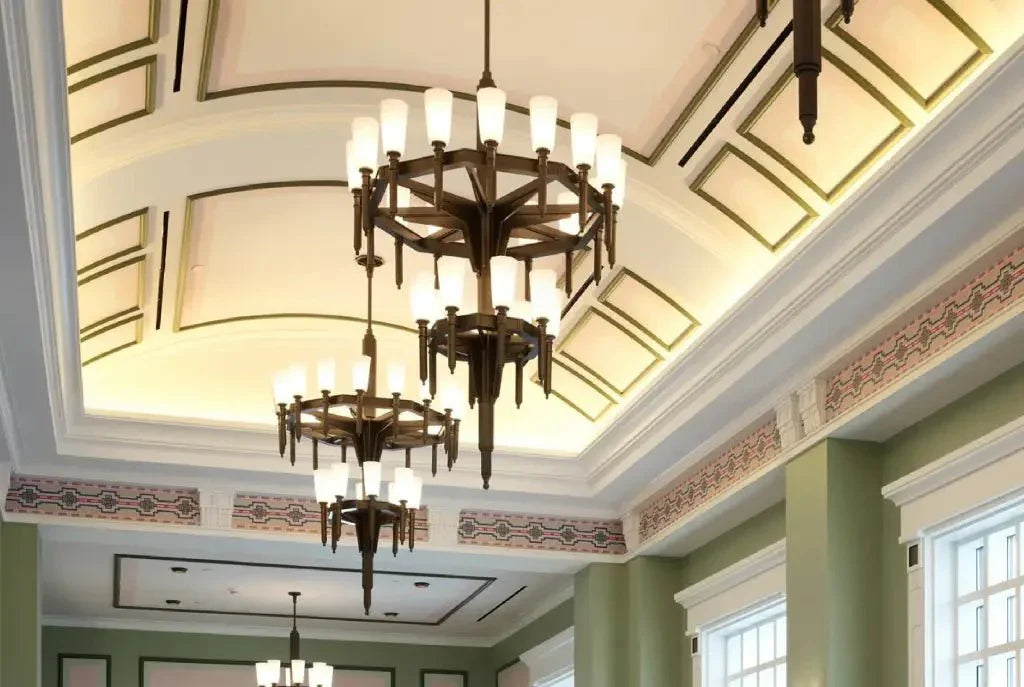 Palladium II chandelier featuring tiered bronze metal frame with multiple clear glass shades for elegant lighting
