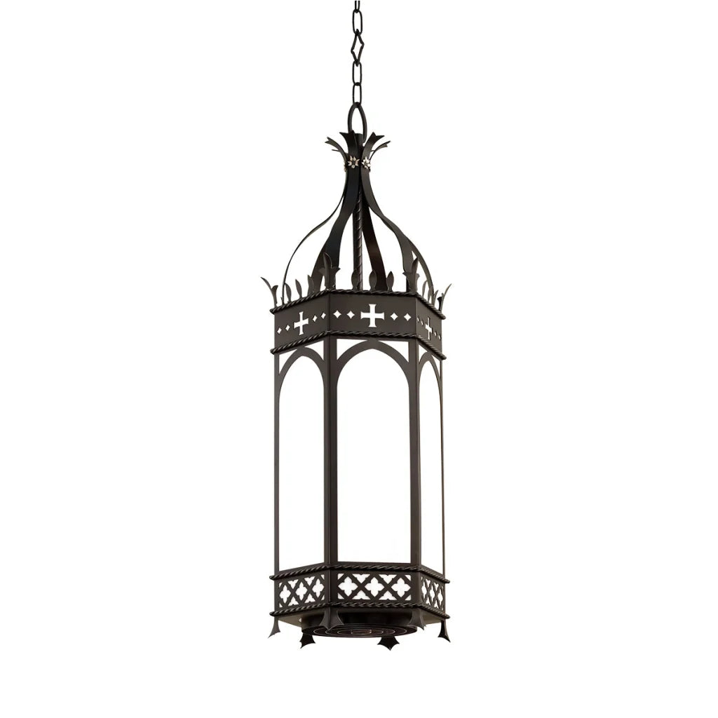Black wrought iron lantern with ornate gothic-inspired design and clear glass panels.