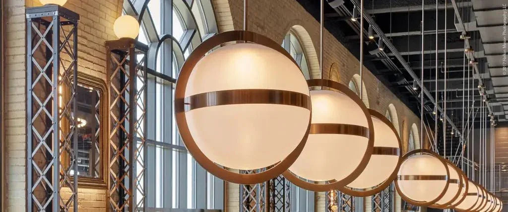 Stria Pendant - polished brass finish, detail of ceiling canopy and suspension rod