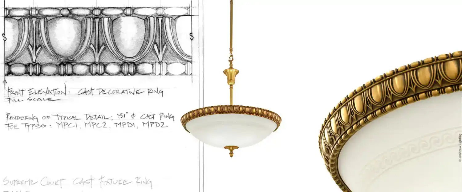 An ornate gold and white pendant light fixture with a decorative rim.