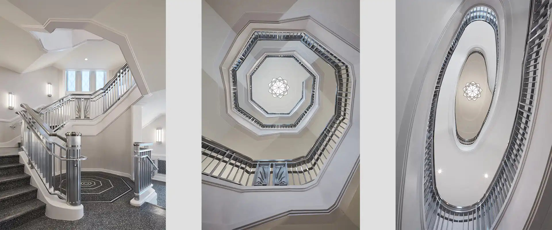 Elegant, modern staircase with metal railings and a geometric pattern at its base.