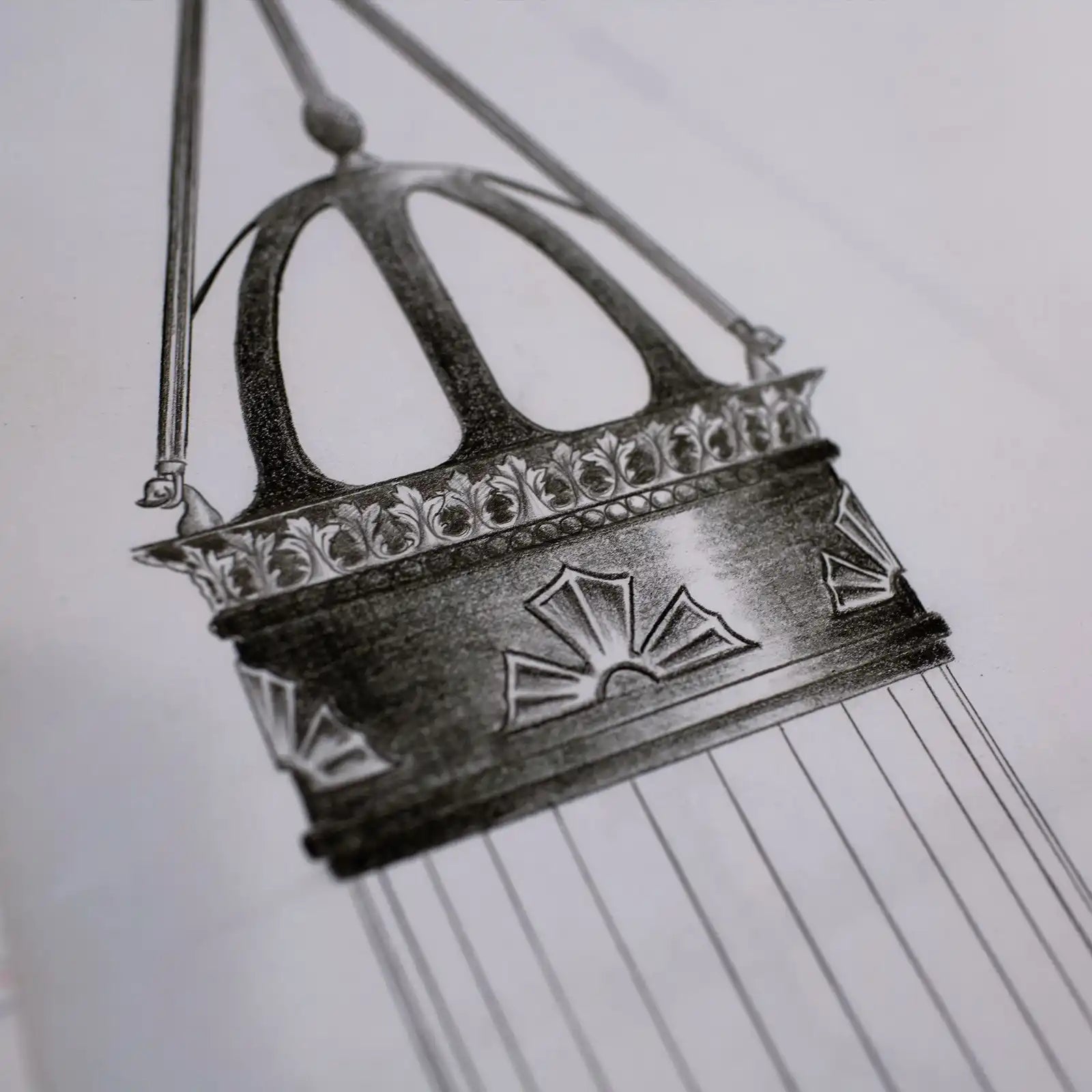 An ornate, dark metal censer or thurible with decorative carvings.