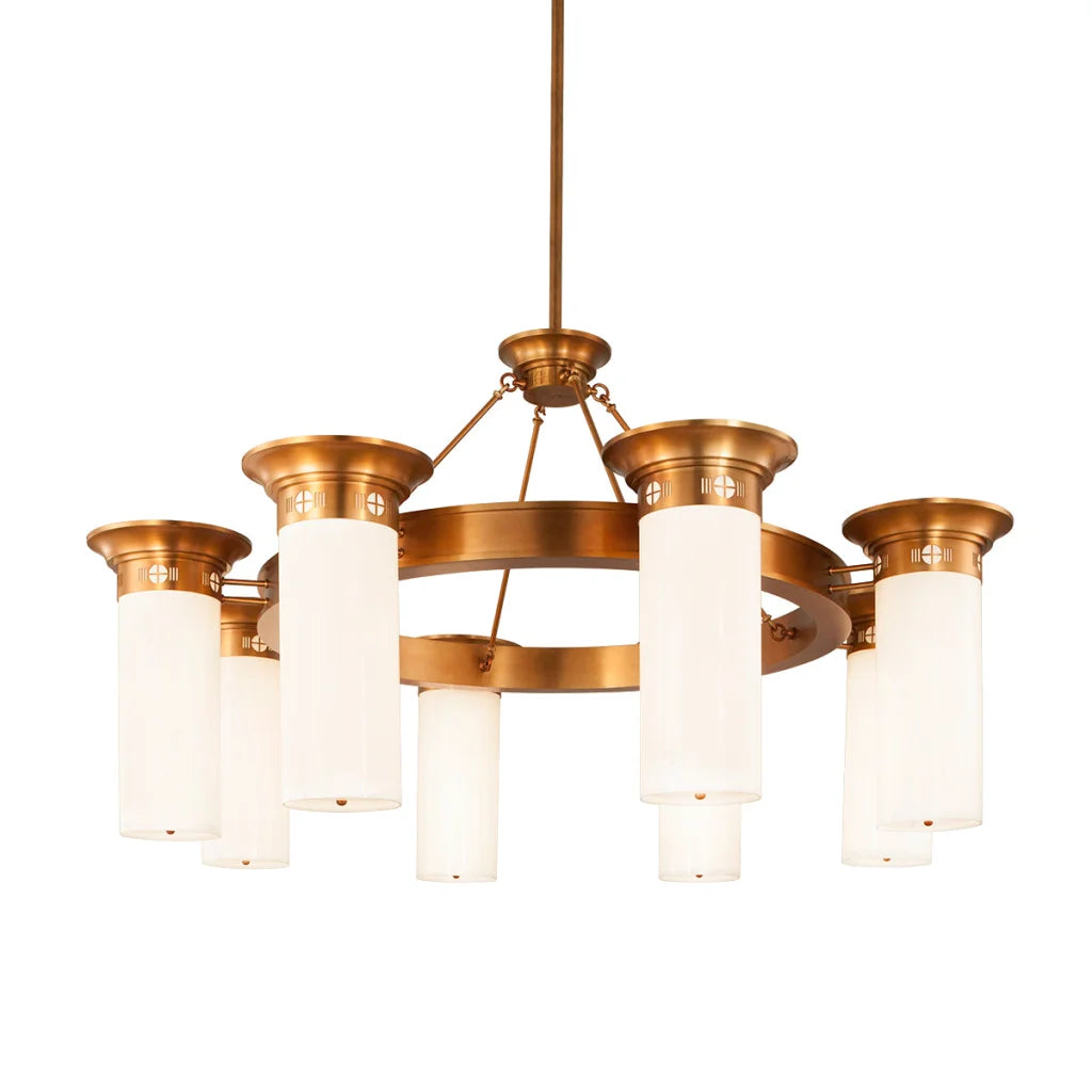 Brass chandelier with frosted glass shades and a circular design.