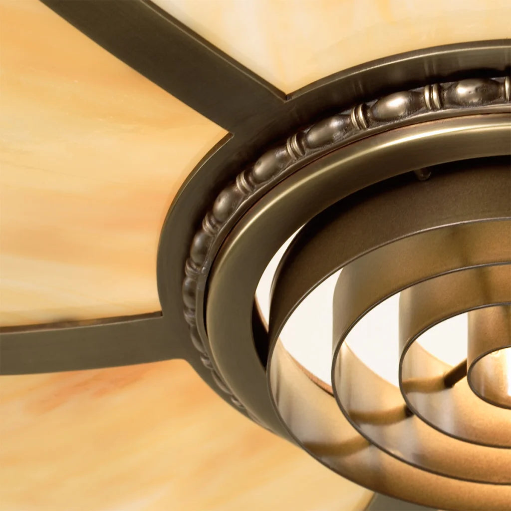 Bronze ceiling fan with intricate carvings and a modern design.