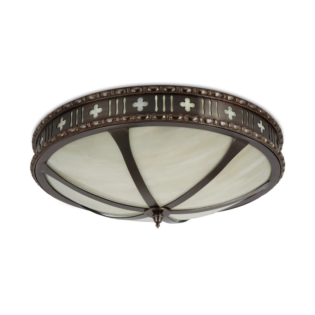 Bronze cross-patterned flush mount light fixture with frosted glass shade.