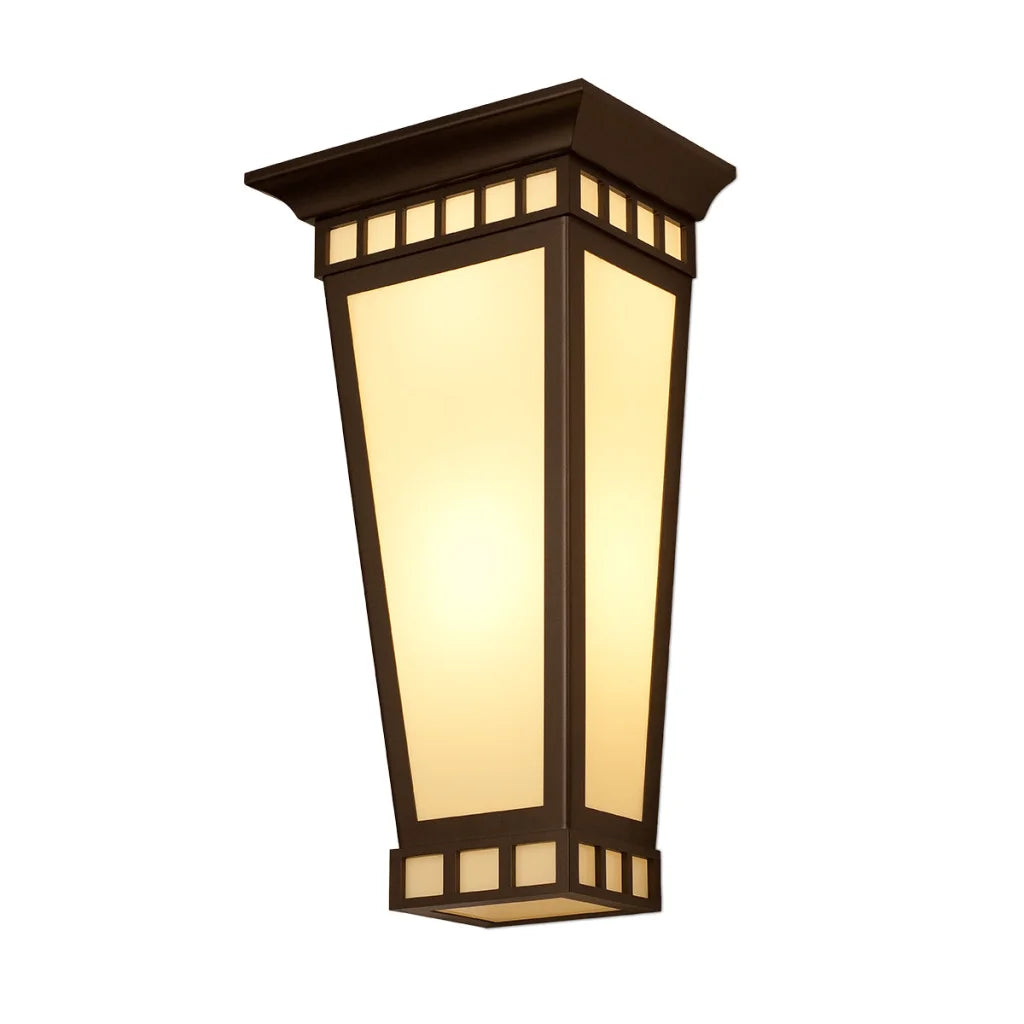 Brown wooden lantern with frosted glass panels and a warm glow from the light inside.