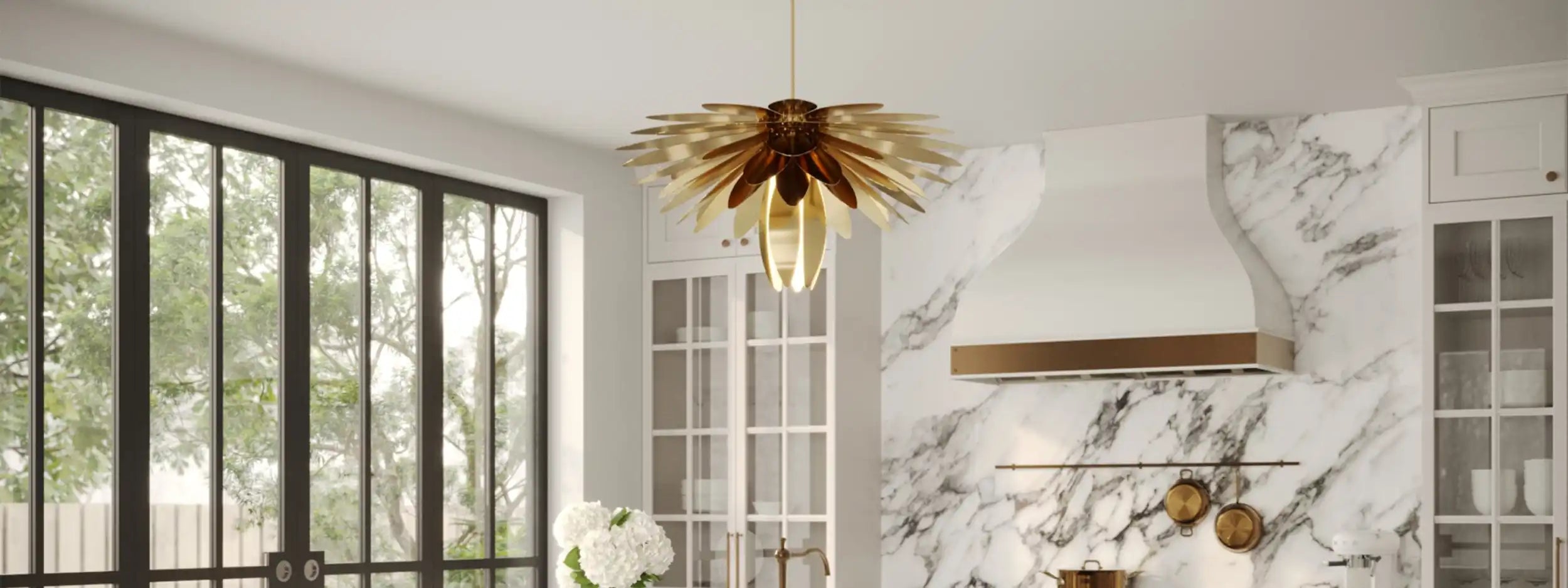 A modern gold and bronze pendant light with a tiered, petal-like design.